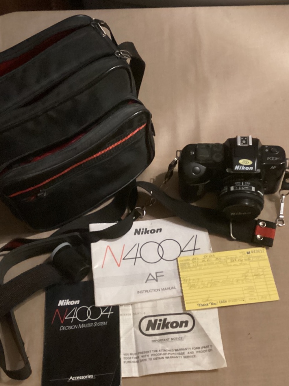 EUC Nikon N4004 AF 35mm Film Camera with Black Body and Red-Trim Bag